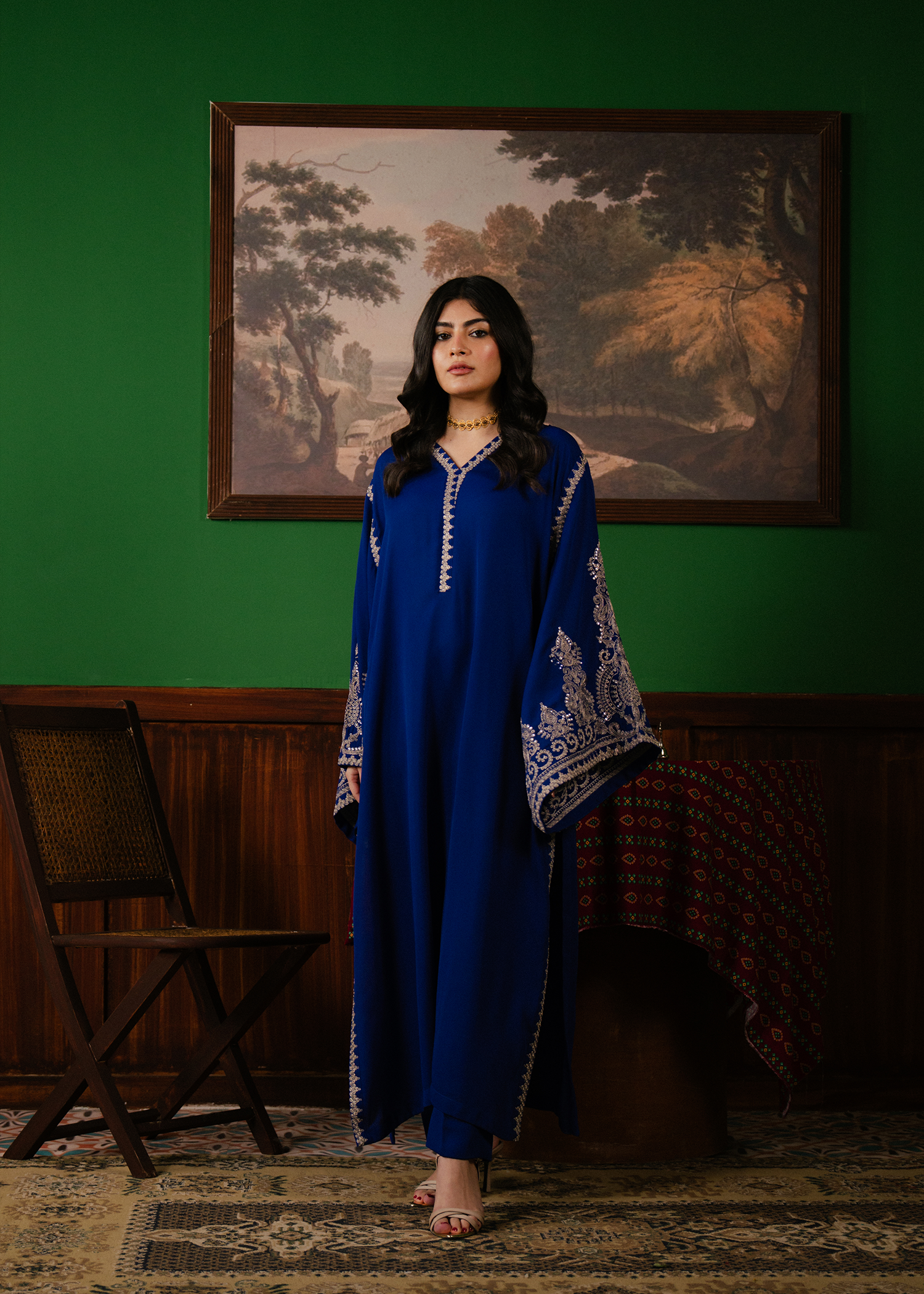 blue embroidered suit