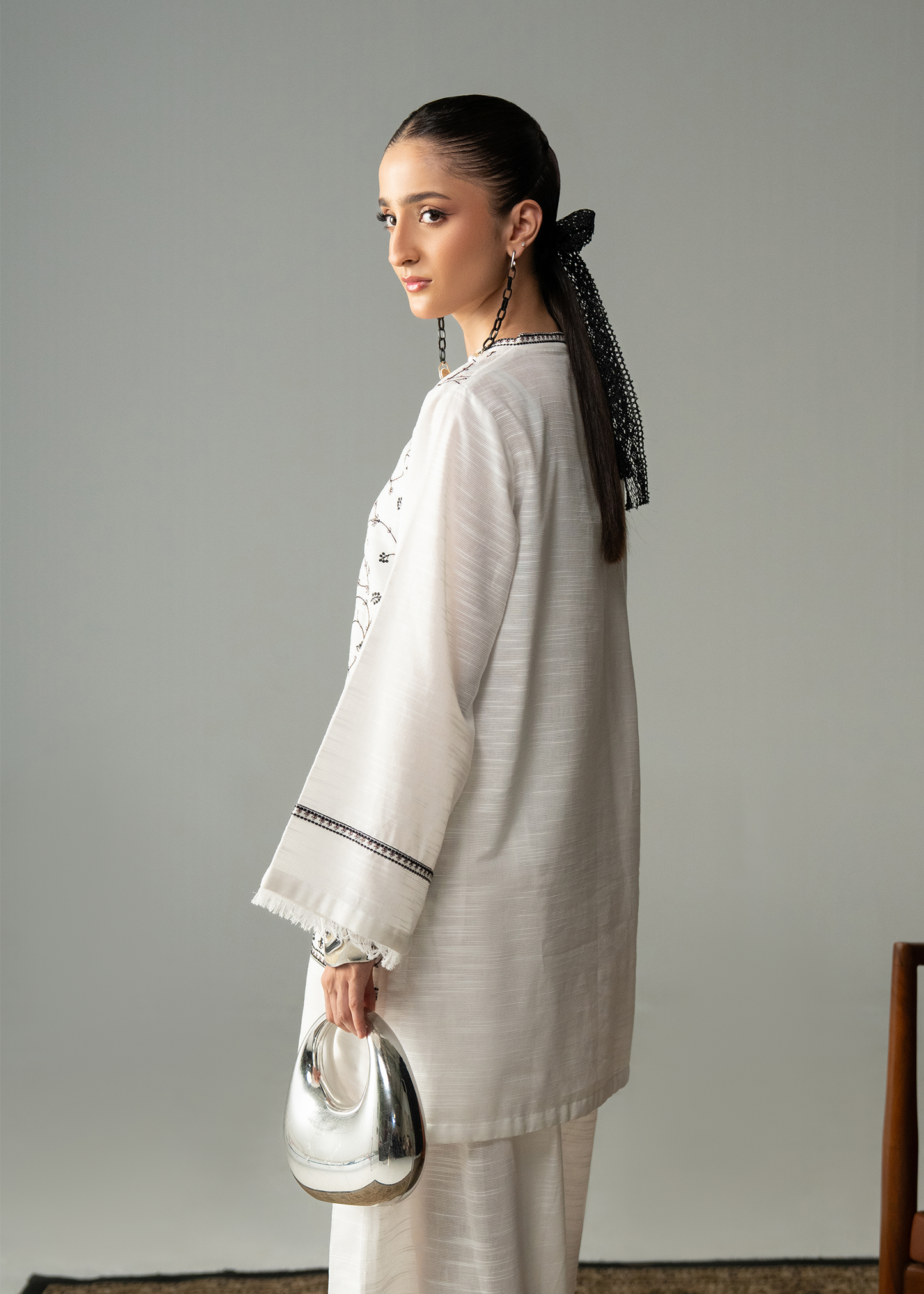 Embroidered White And Black Khaddar Suit