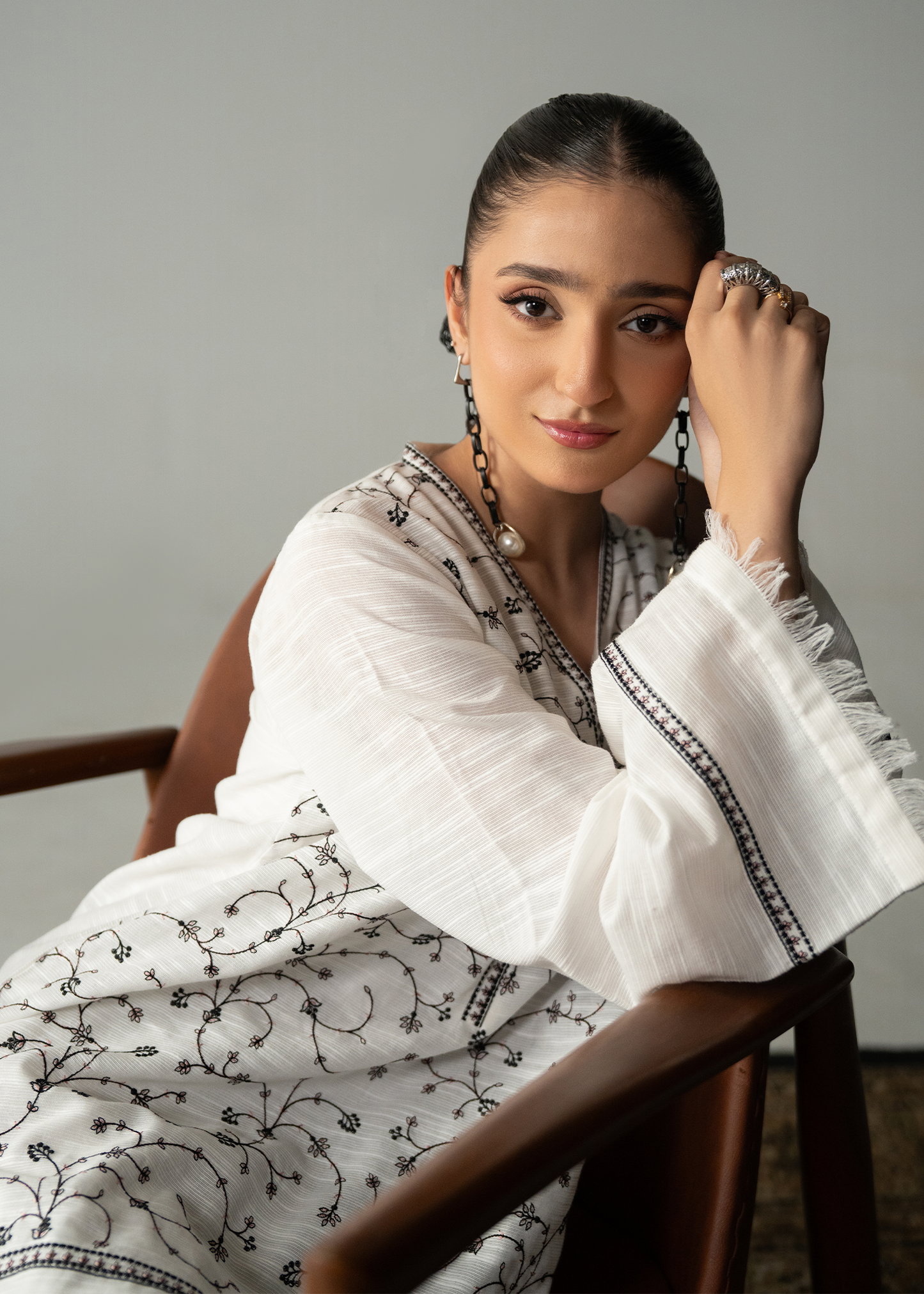 Embroidered White And Black Khaddar Suit