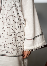 Embroidered White And Black Khaddar Suit