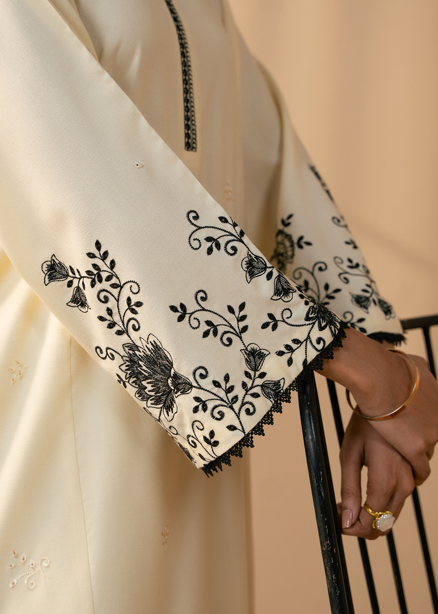 black embroidered suit