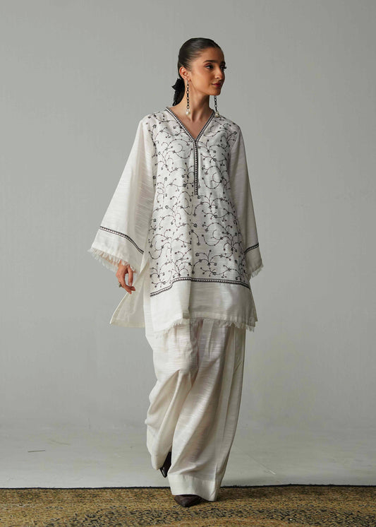 Embroidered White And Black Khaddar Suit