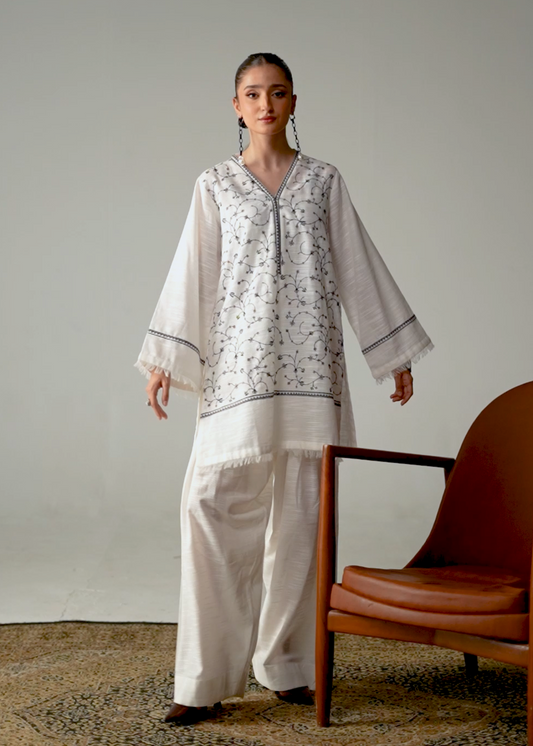 Embroidered White And Black Khaddar Suit